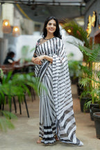 Black & white stripe organza saree with hand work blouse