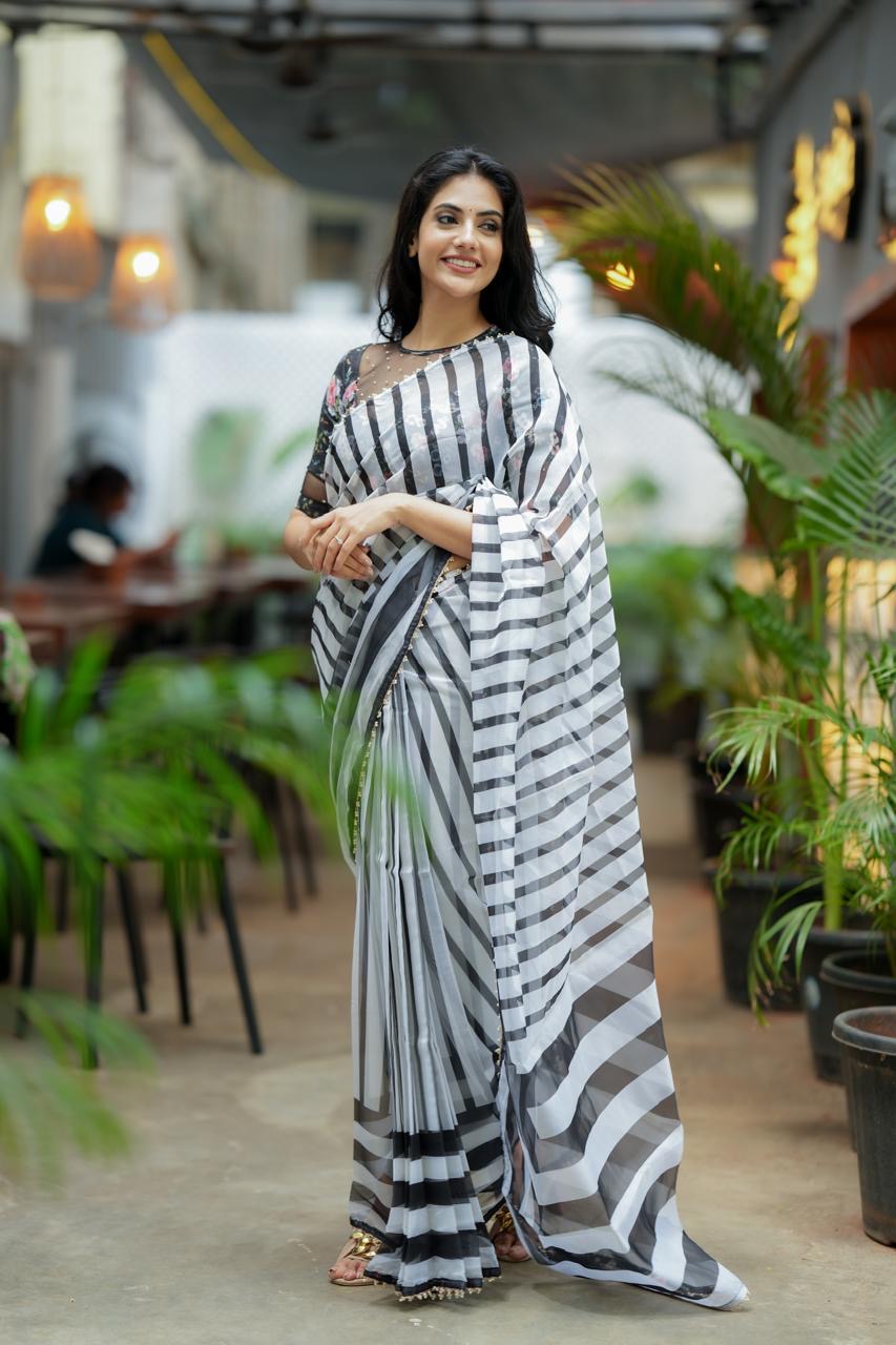 Black & white stripe organza saree with hand work blouse