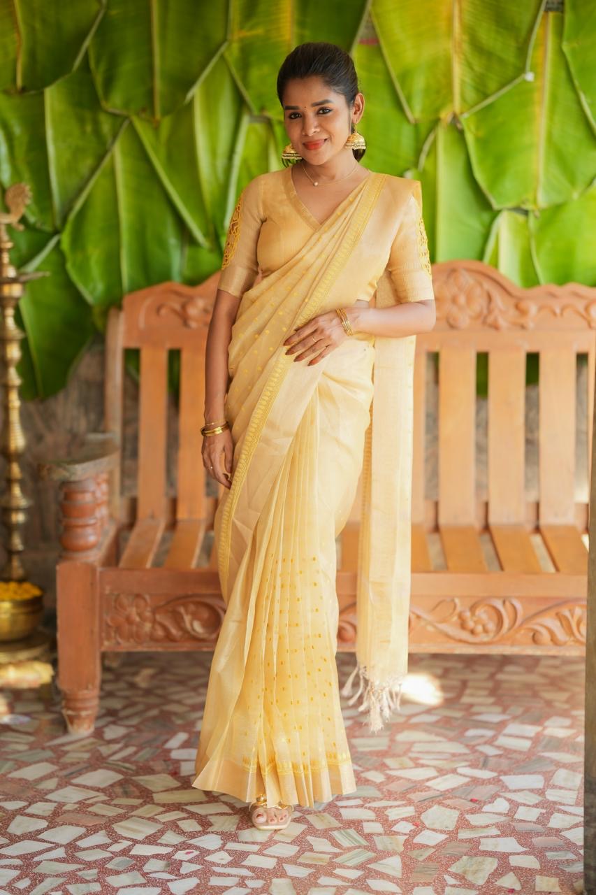 Gold kota doria saree with hand work blouse