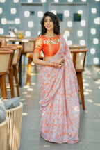 Reddish orange tissue floral hand work blouse(only blouse)