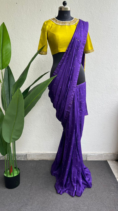 Purple soft jute saree with yellow JEWEL neck hand work blouse