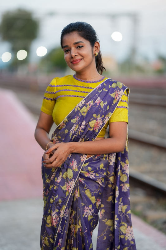Blue floral tissue saree with lime hand work blouse