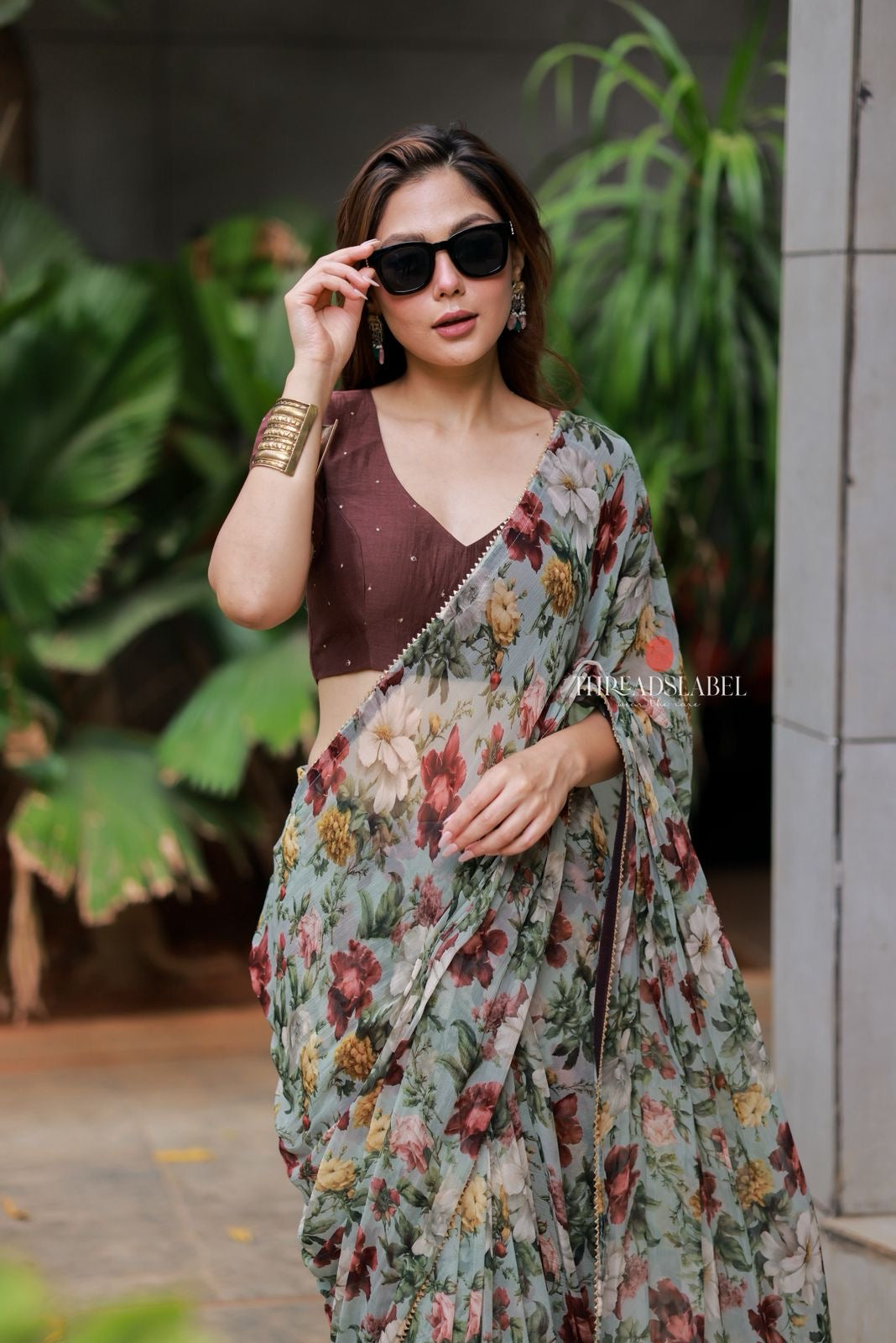 Sage green floral chiffon saree with hand work blouse