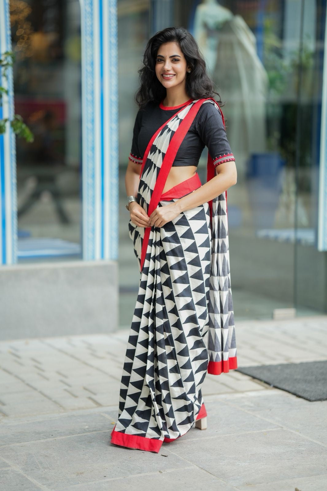 Black & white triangle saree with black hand work blouse