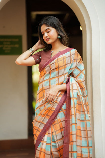 Multi checked kota saree with brown embroidery blouse