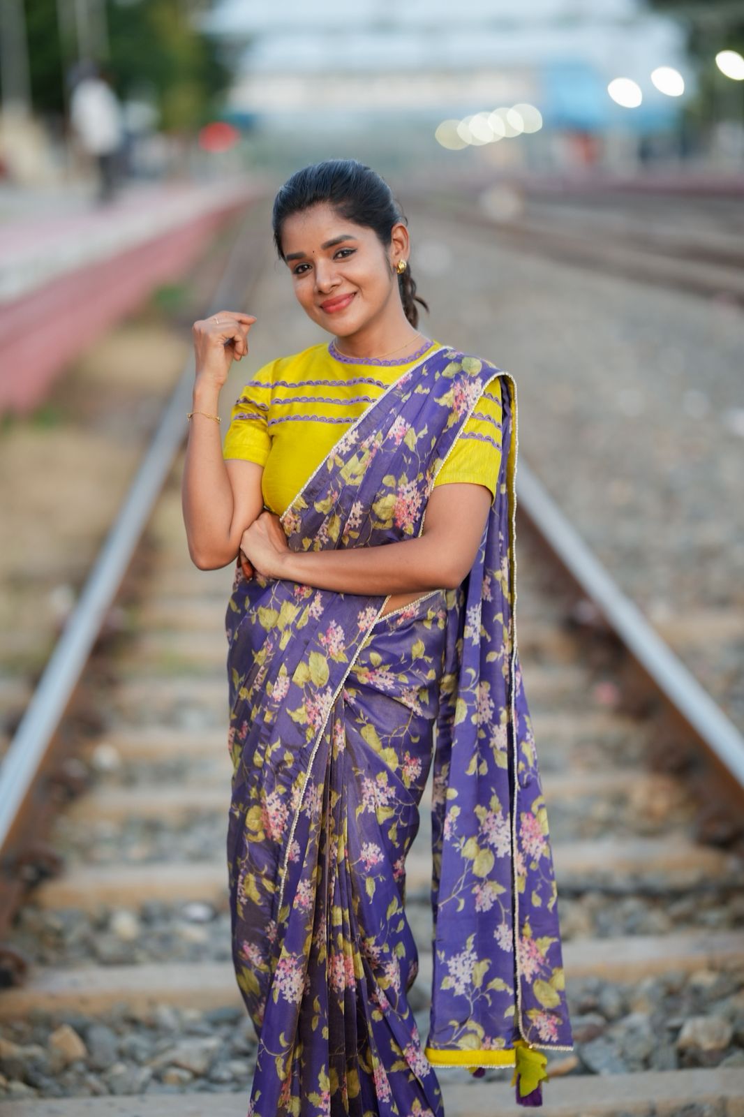 Blue floral tissue saree with lime hand work blouse