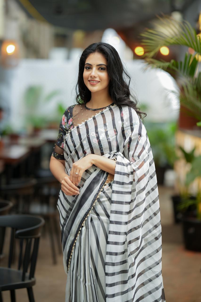 Black & white stripe organza saree with hand work blouse