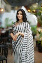 Black & white stripe organza saree with hand work blouse