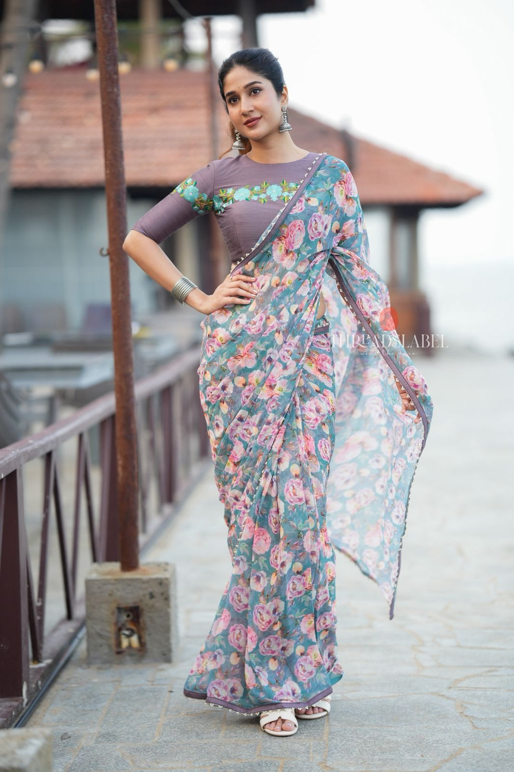 Blue floral georgette saree with grey embroidery blouse