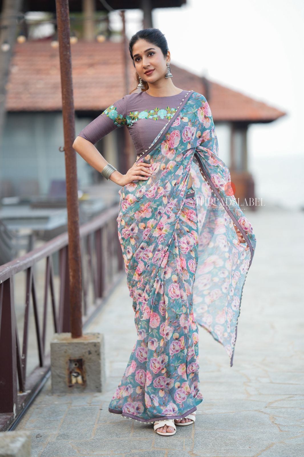 Blue floral georgette saree with grey embroidery blouse