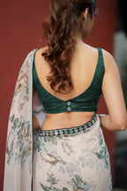 Half white chiffon floral saree with hand work blouse