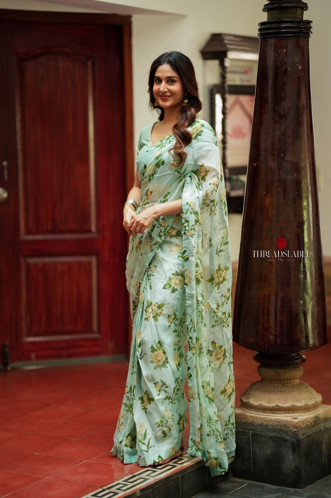 Sea green viscose jute floral saree (only saree)
