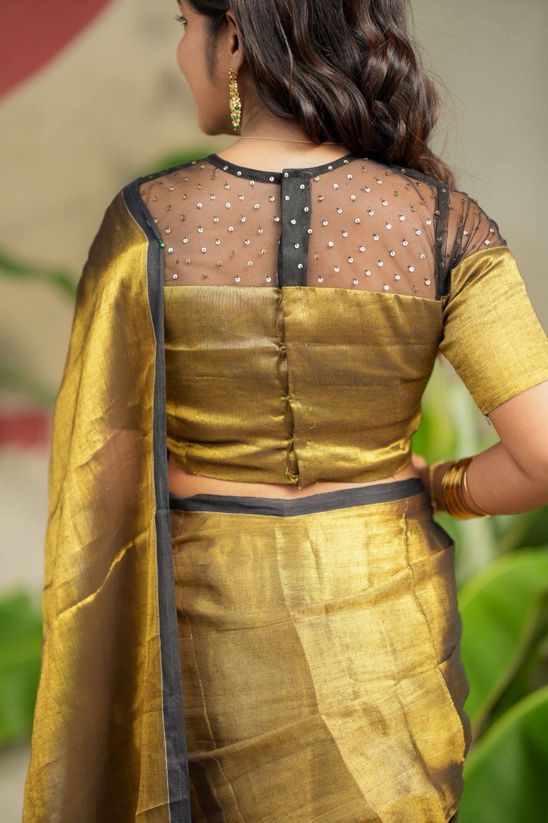 Golden soft tissue saree with hand work blouse