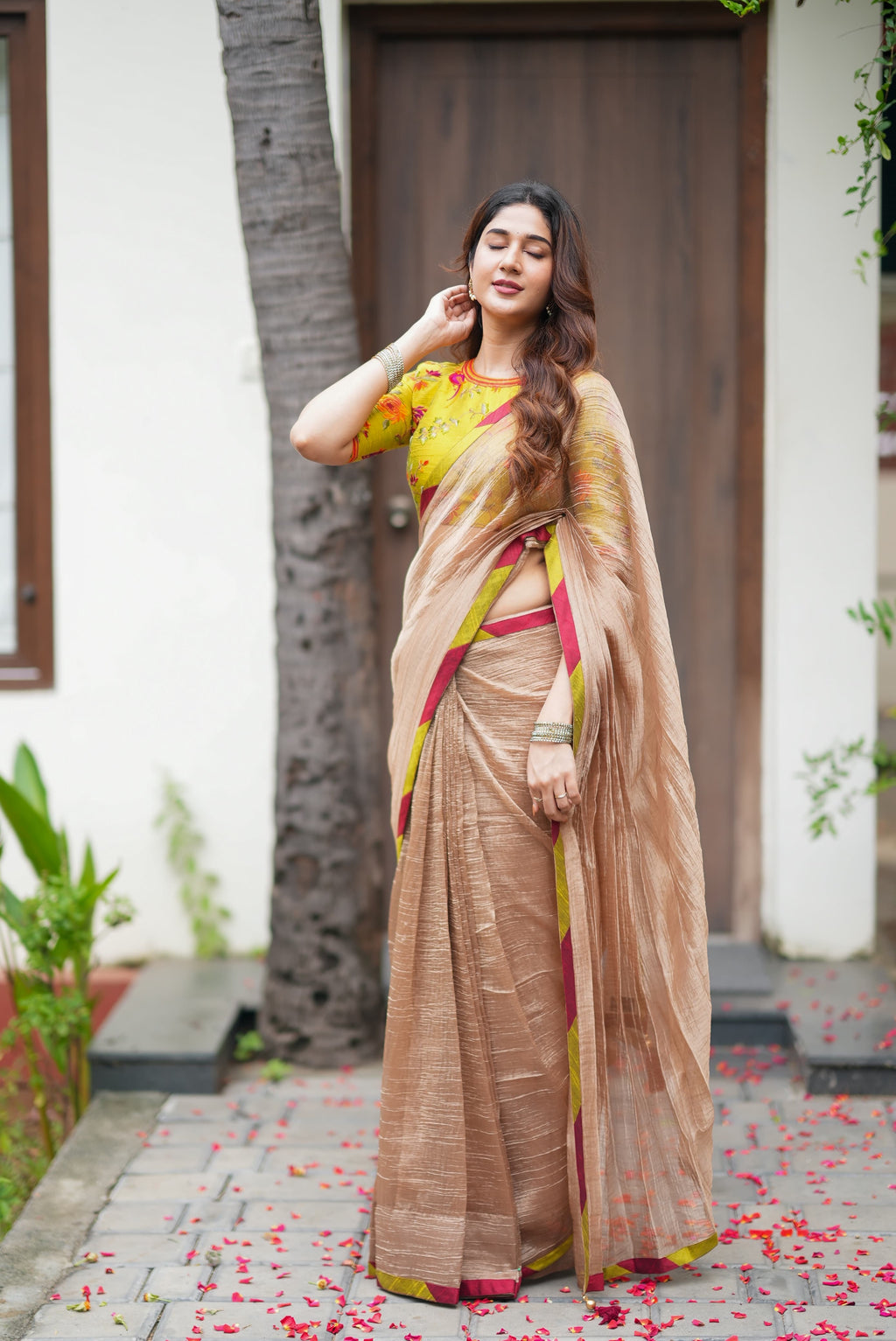 Antique gold tissue saree with parrot handwork blouse