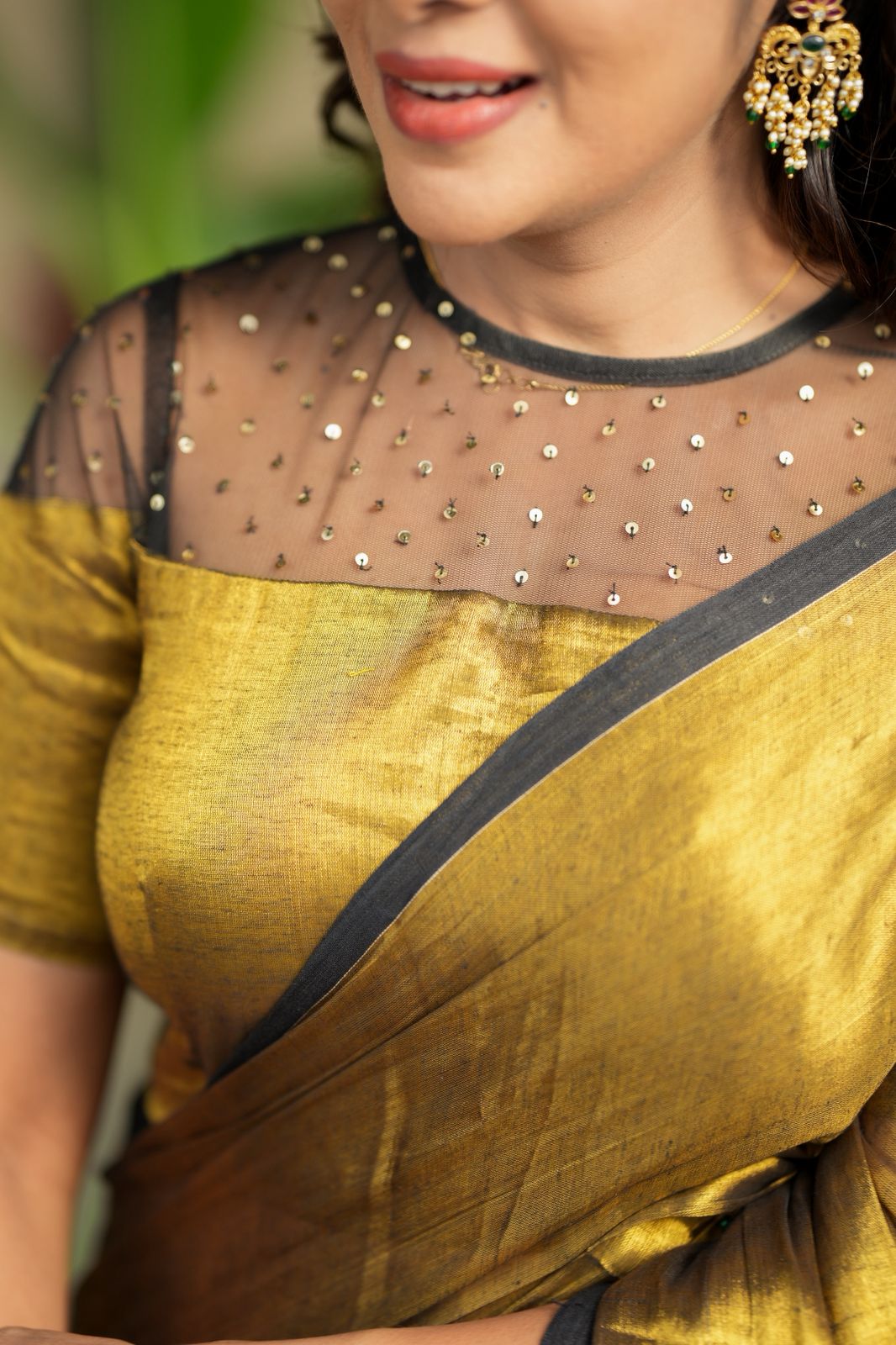 Golden soft tissue saree with hand work blouse