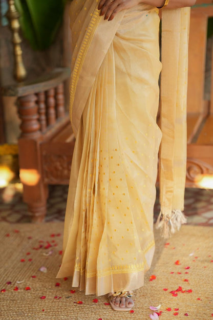 Gold kota doria saree with hand work blouse