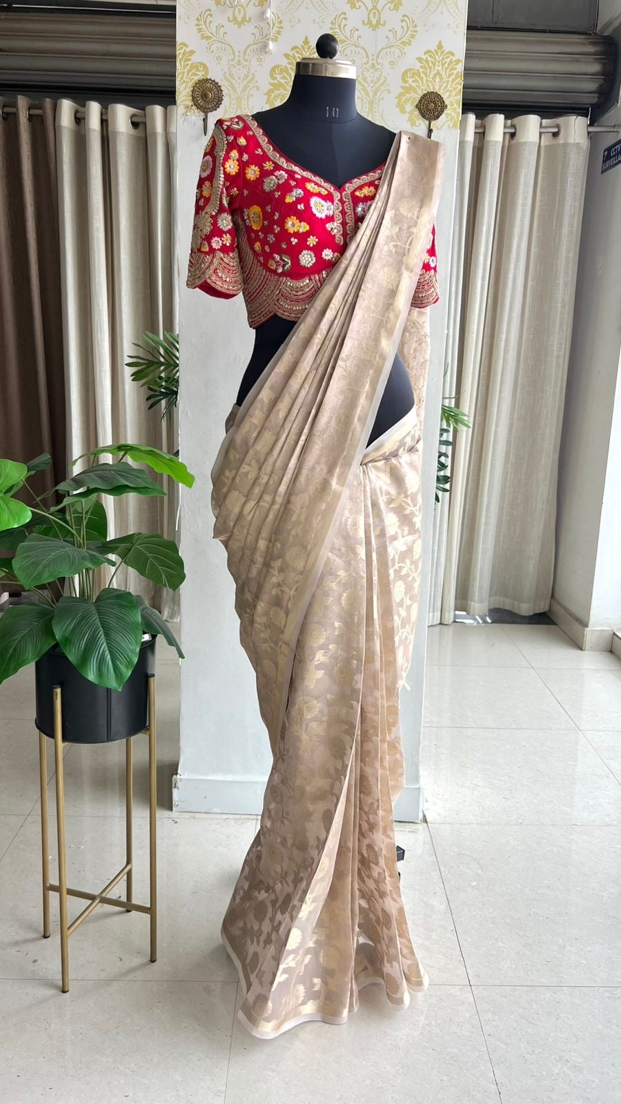 Half white banarasi saree with deep pink silk hand embroidery blouse