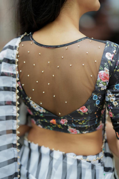 Black & white stripe organza saree with hand work blouse