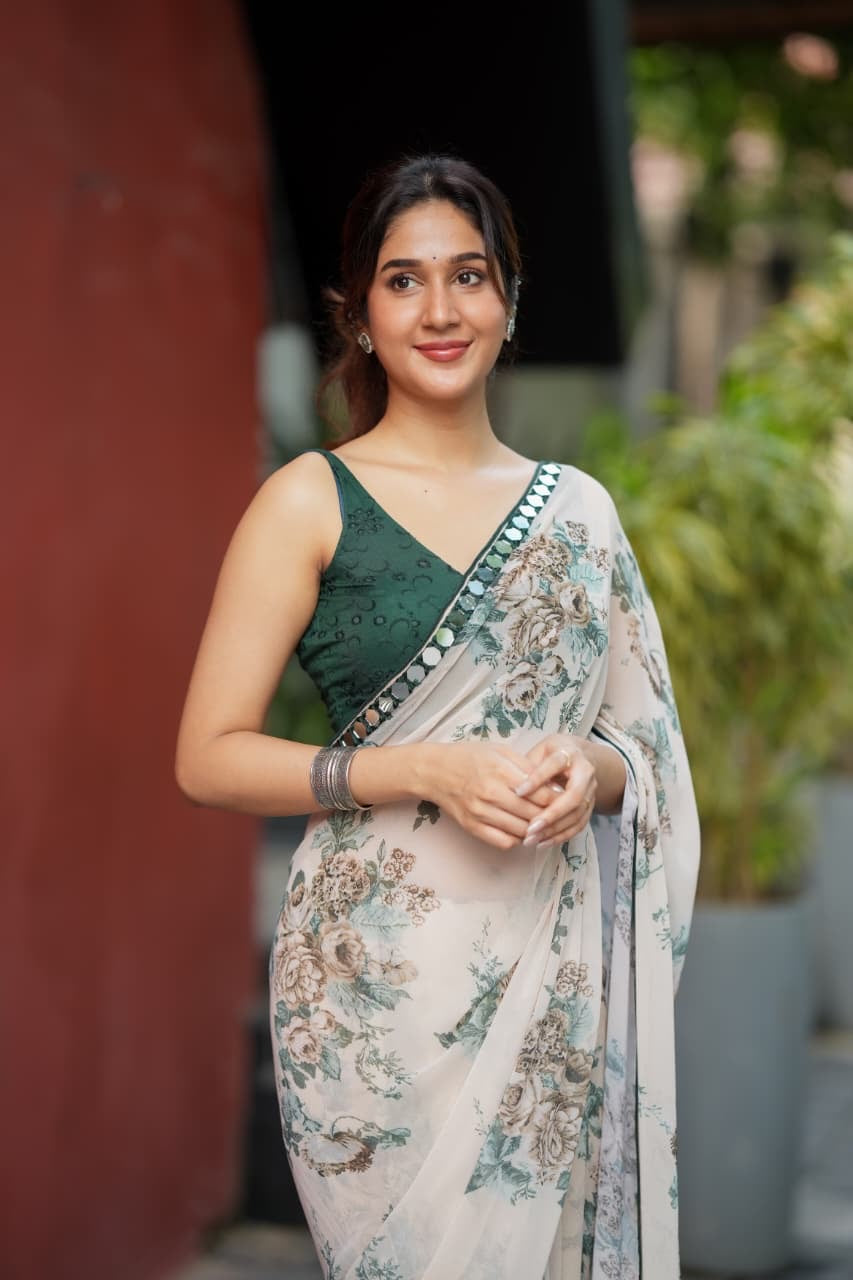 Half white chiffon floral saree with hand work blouse