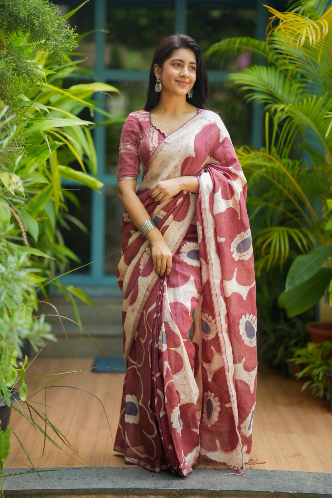 Brown linen floral saree with hand work blouse