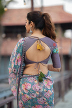 Blue floral georgette saree with grey embroidery blouse