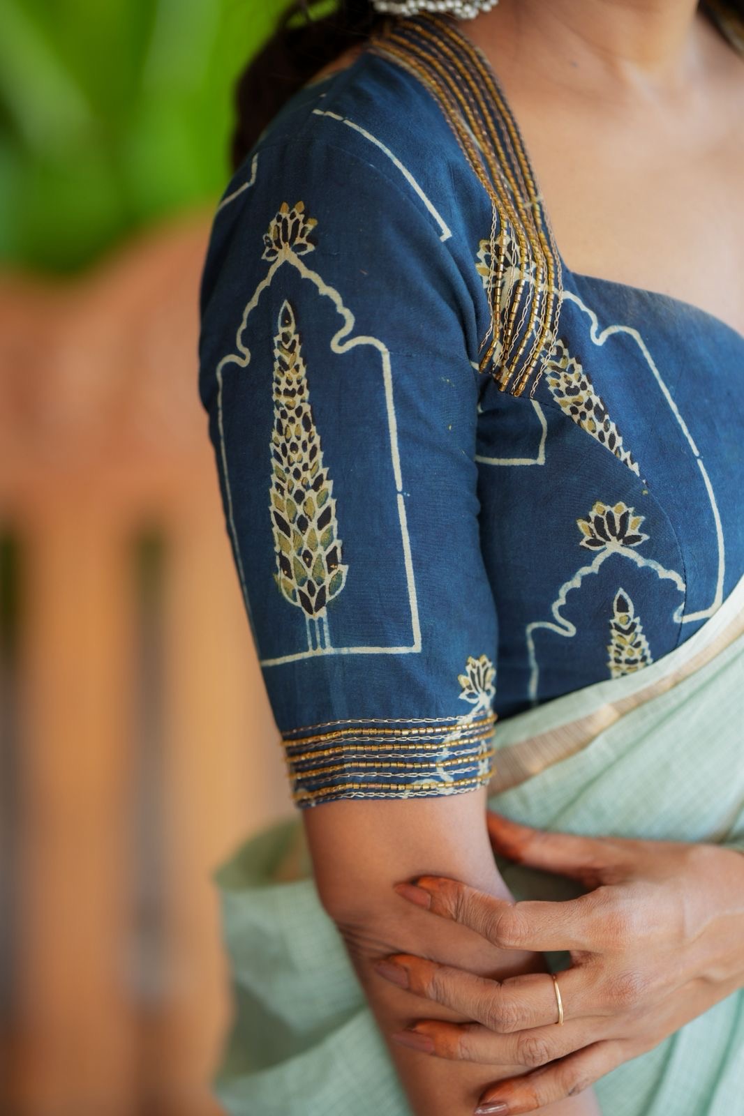 Aqua blue kota doria saree with hand work blouse