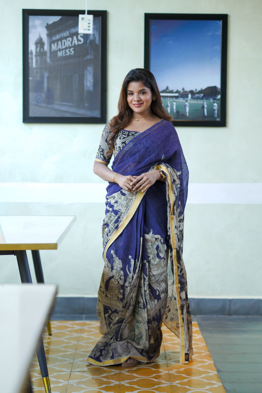 Purple kota saree with kalamkari work blouse