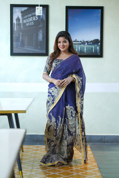 Purple kota saree with kalamkari work blouse