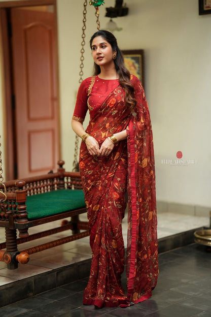 Maroon chiffon floral saree with hand work blouse