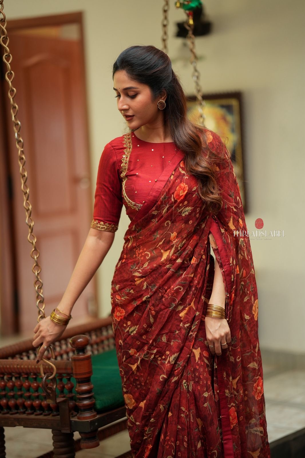 Maroon chiffon floral saree with hand work blouse