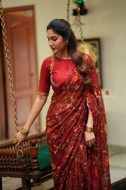 Maroon chiffon floral saree with hand work blouse