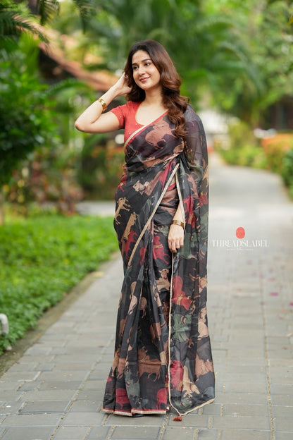 Black cow kota saree with paisley hand work blouse
