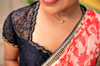 Cream red kota doria designer saree