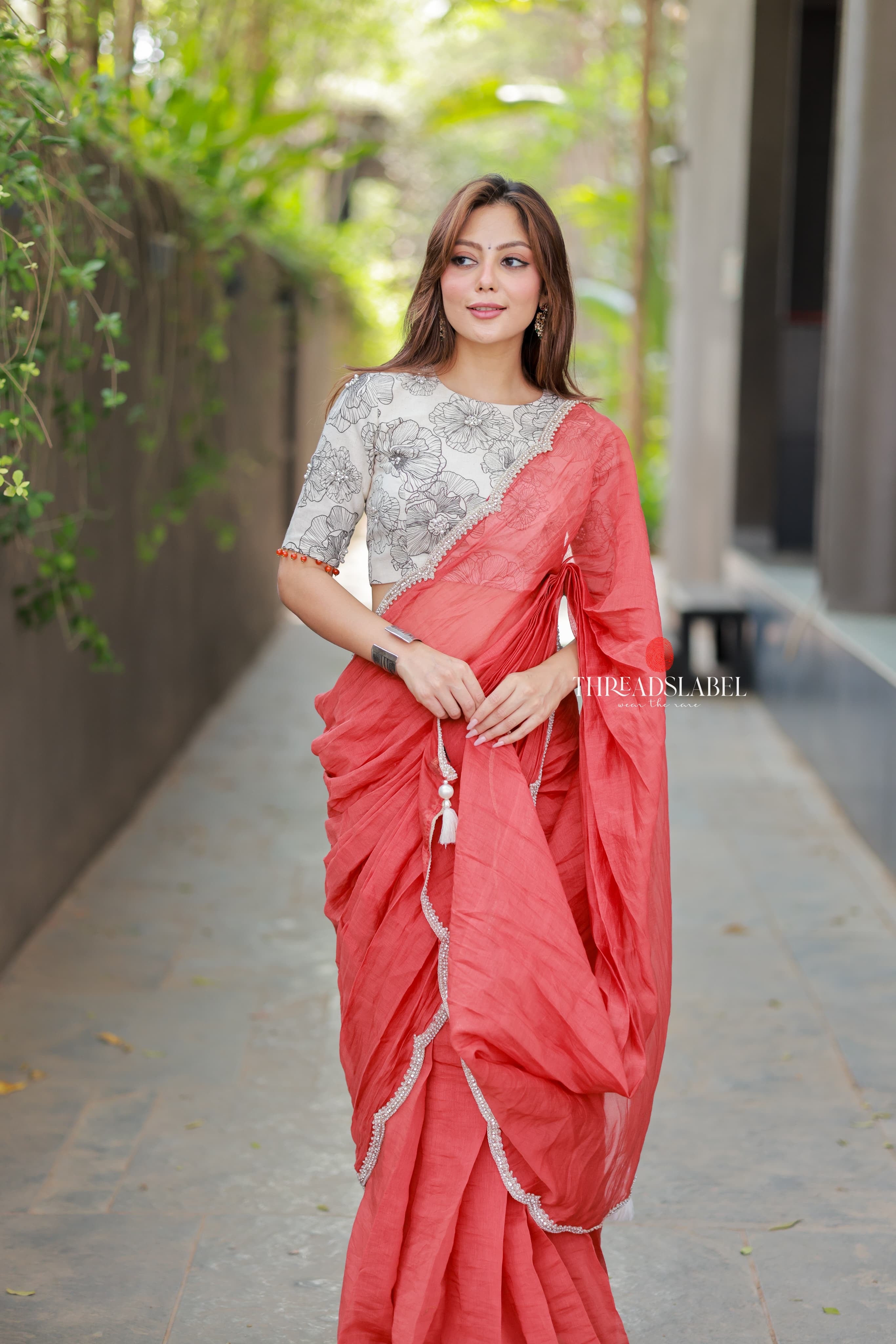 Orange rust saree with pearl work blouse