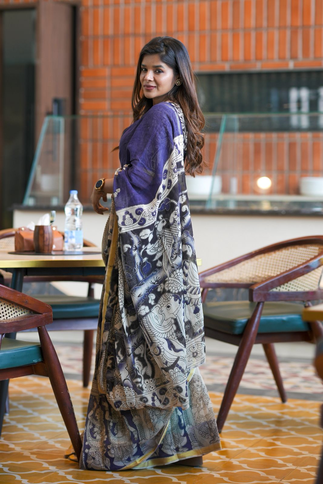 Purple kota saree with kalamkari work blouse
