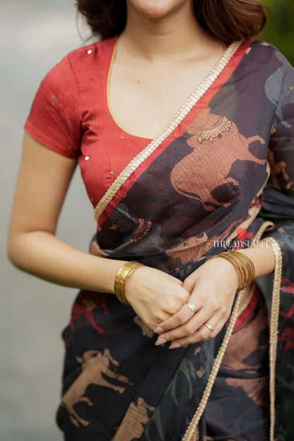Black cow kota saree with paisley hand work blouse