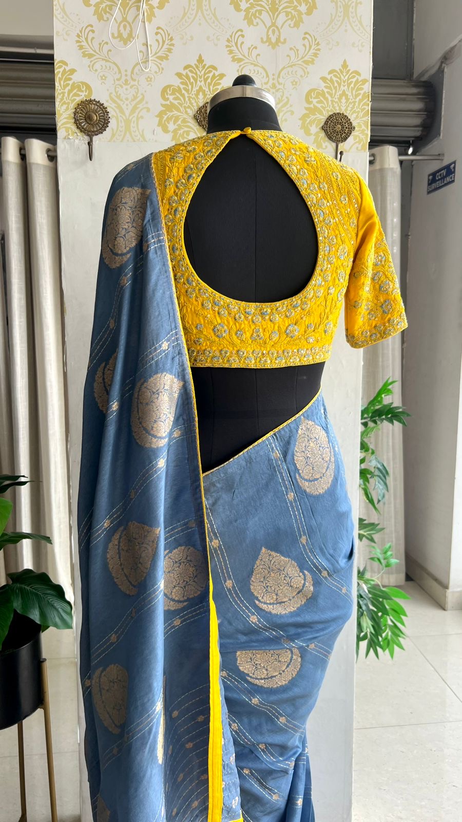 Blue banarasi silk saree with yellow embroidery blouse