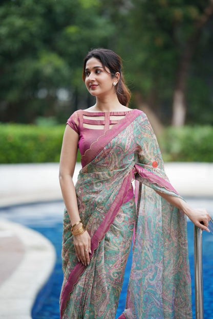 Jade green viscose jute saree with pink tissue blouse
