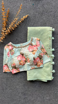 Light green tissue saree with mirror floral blouse