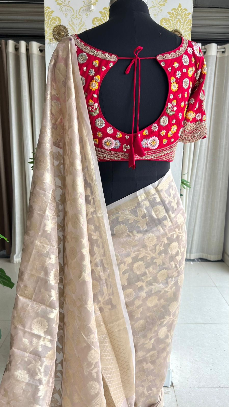 Half white banarasi saree with deep pink silk hand embroidery blouse