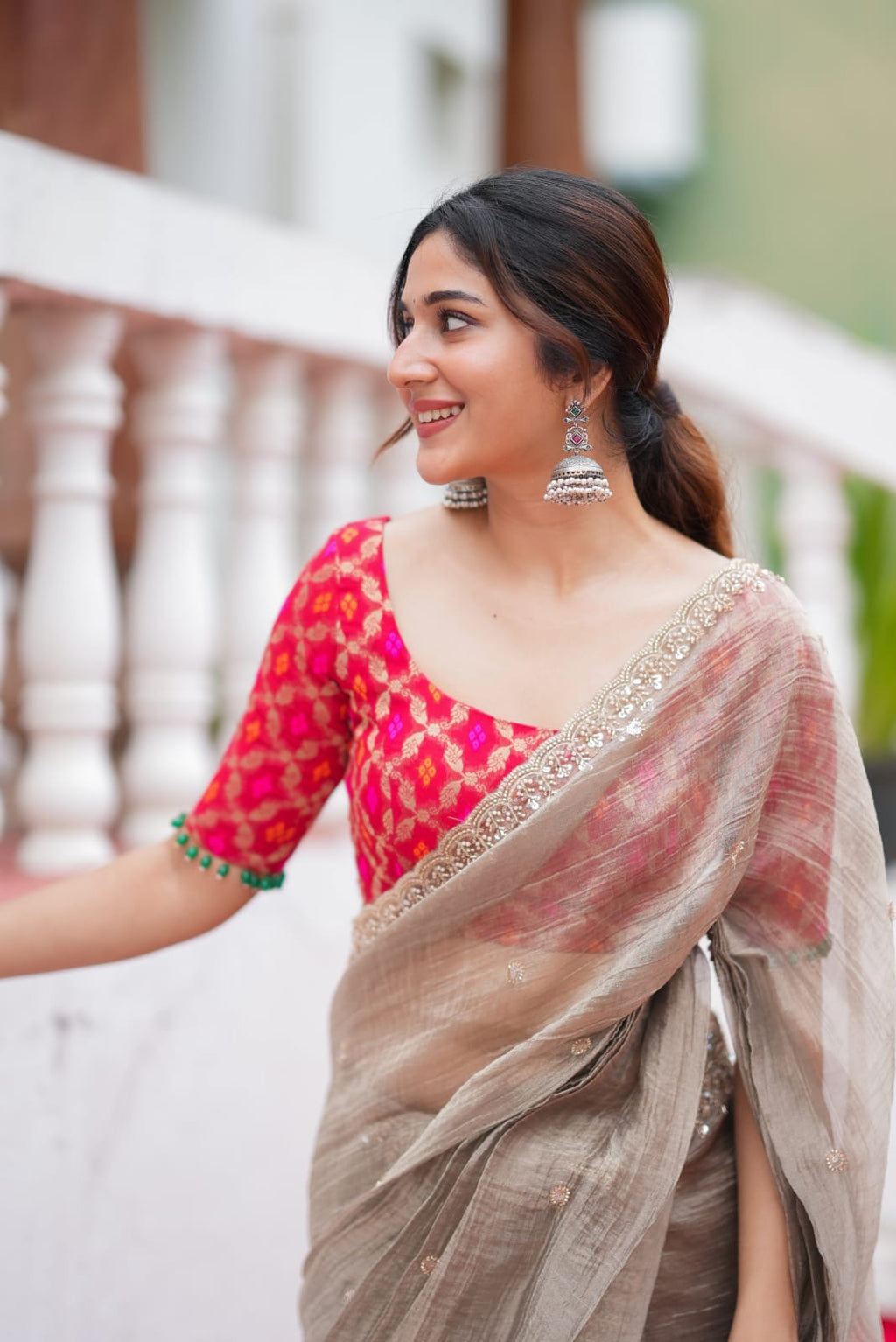 Grey tissue saree with red banarasi blouse