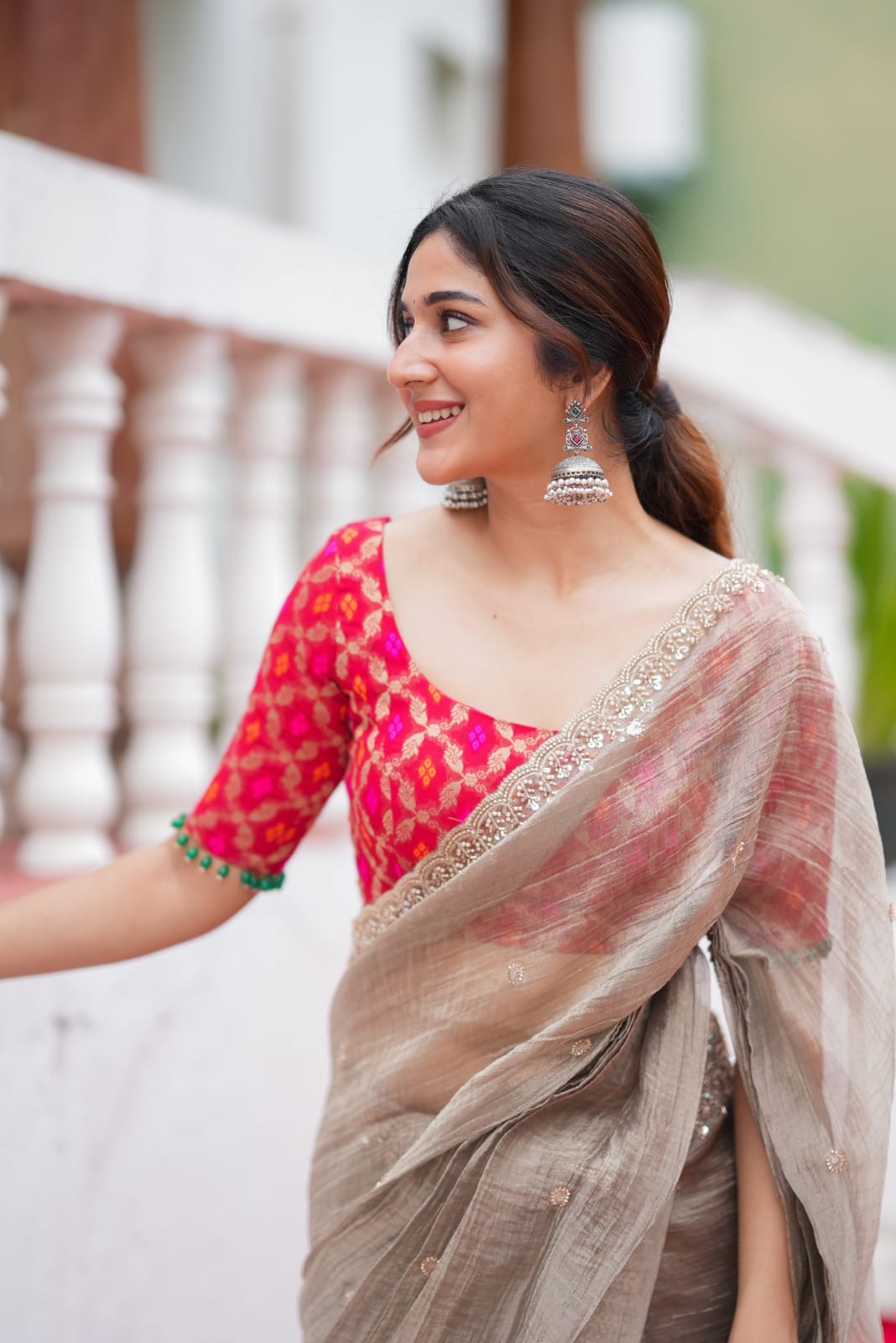 Grey tissue saree with red banarasi blouse