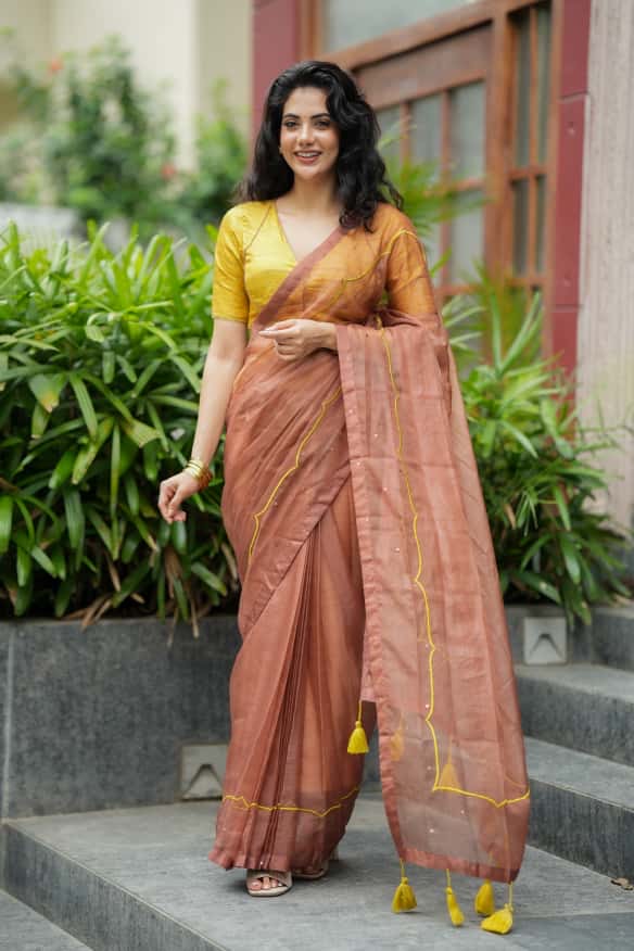 Brown soft organza saree with lime green ikkat blouse