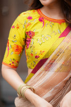 Antique gold tissue saree with parrot handwork blouse