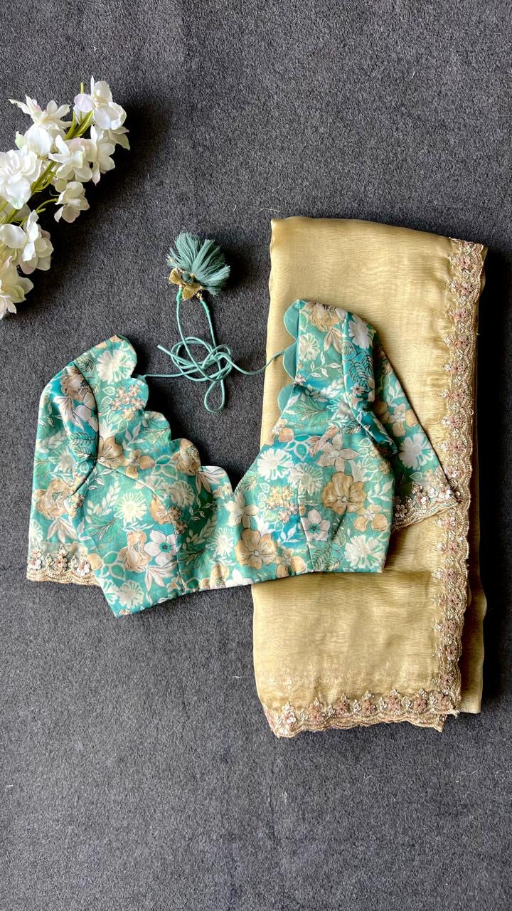 Golden soft tissue saree with blue floral embroidery blouse