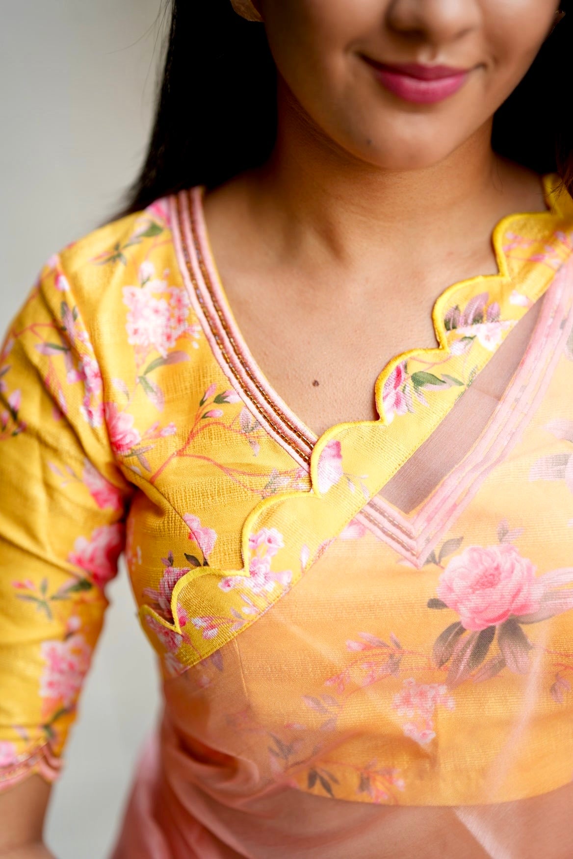 Peach organza saree with yellow floral hand work blouse