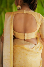 Gold kota doria saree with hand work blouse