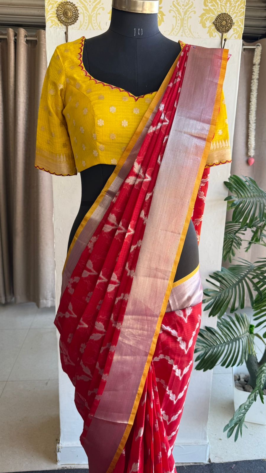 Red soft kota silk saree with yellow embroidered blouse