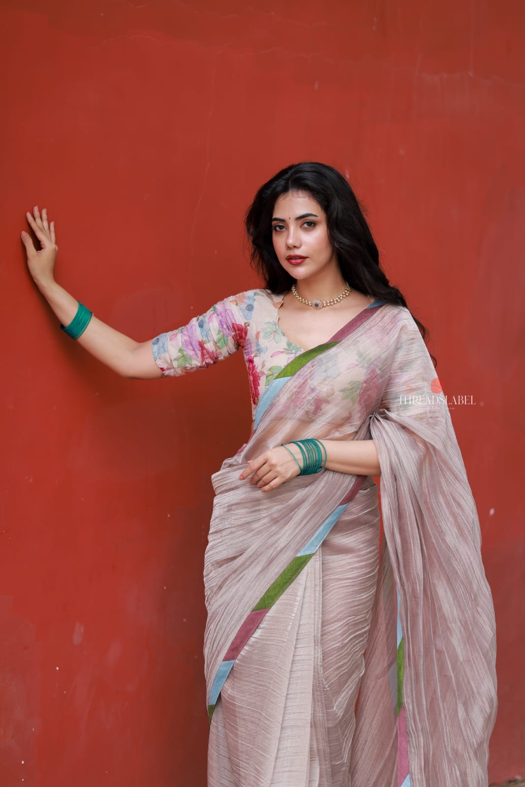 Dusty silver tissue saree with pearl hand work blouse
