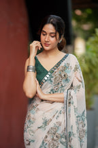 Half white chiffon floral saree with hand work blouse